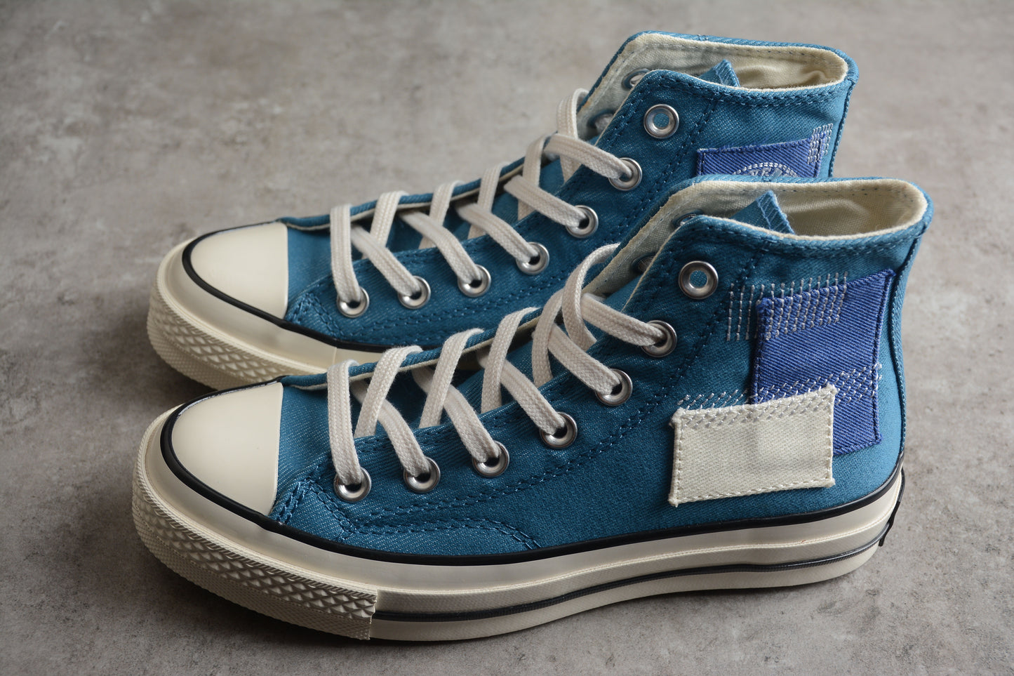 Converse blue patches