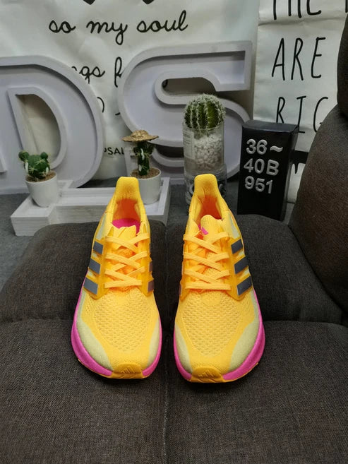 Adidas UltraBoost yellow pink