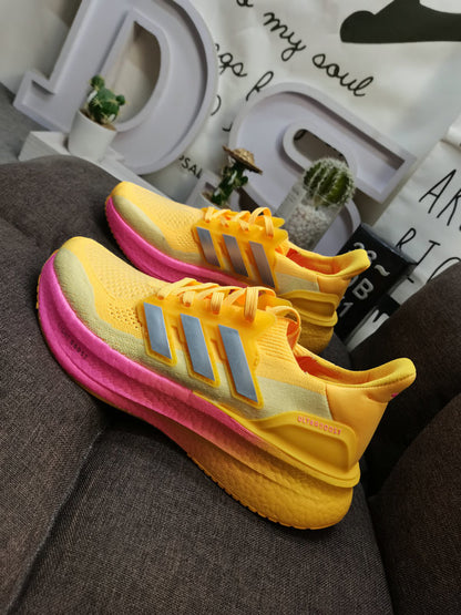 UltraBoost yellow pink