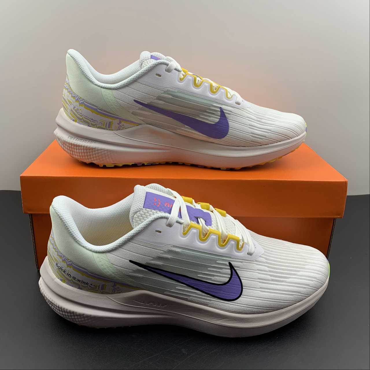 Zoom Pegasus 9 white purple yellow