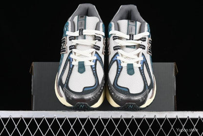 New Balance 1906R metallic teal blue
