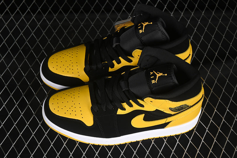 Jordan 1 Mid black yellow
