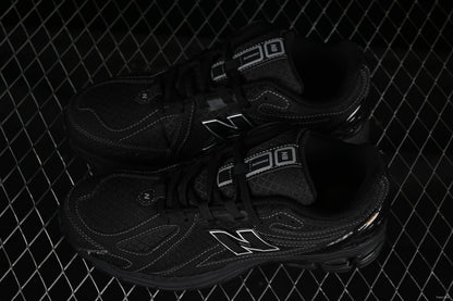 New Balance 1906R black white costures