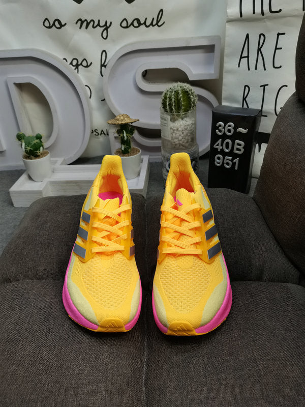 UltraBoost yellow pink