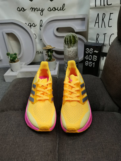 UltraBoost yellow pink