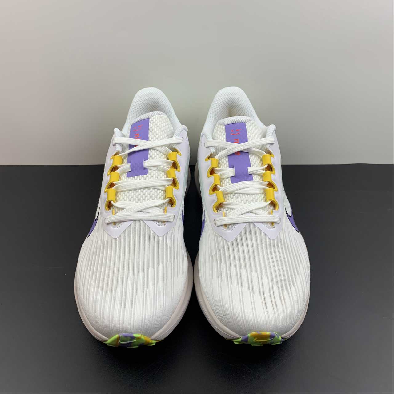 Zoom Pegasus 9 white purple yellow