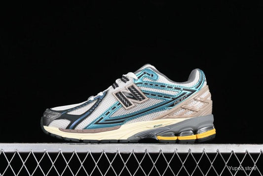 New Balance 1906R metallic teal blue