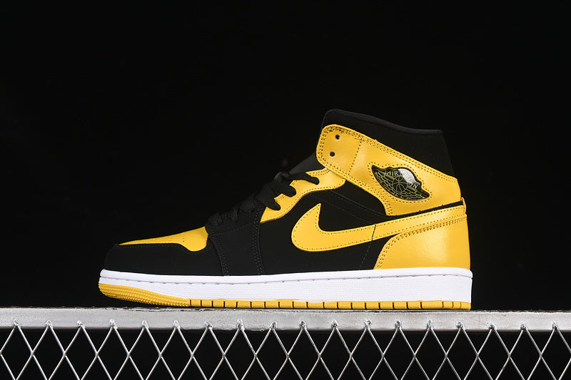 Jordan 1 Mid black yellow