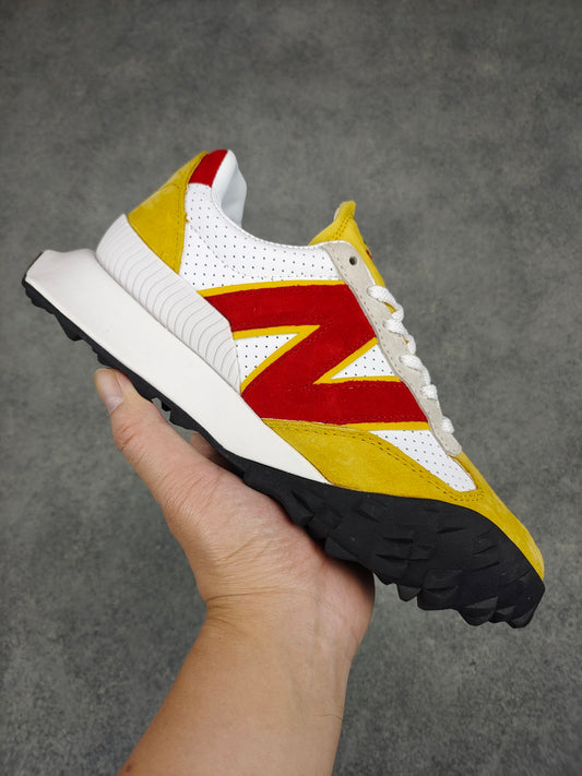 New Balance XC72 yellow red