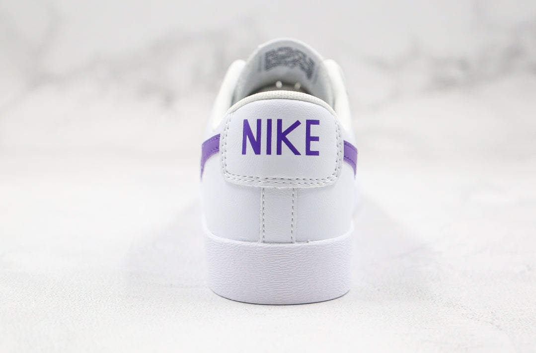 Blazer low purple swoosh