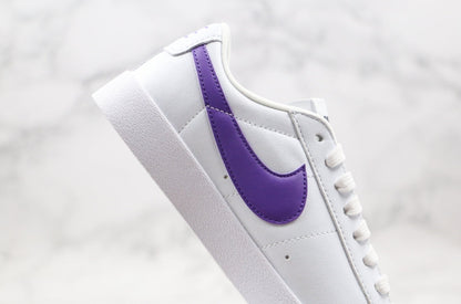 Blazer low purple swoosh