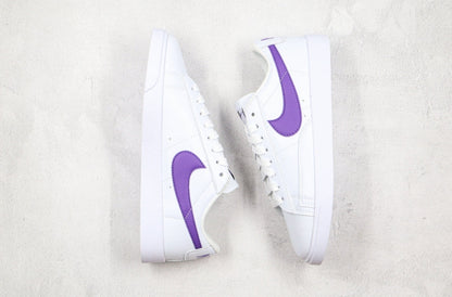 Blazer low purple swoosh