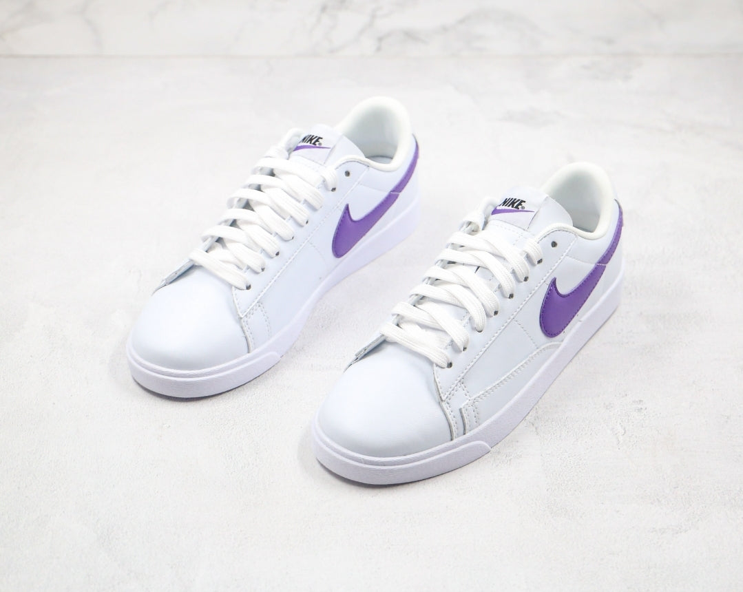 Blazer low purple swoosh