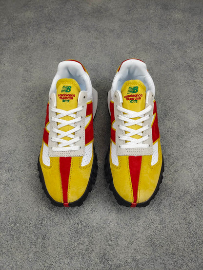 New Balance XC72 yellow red